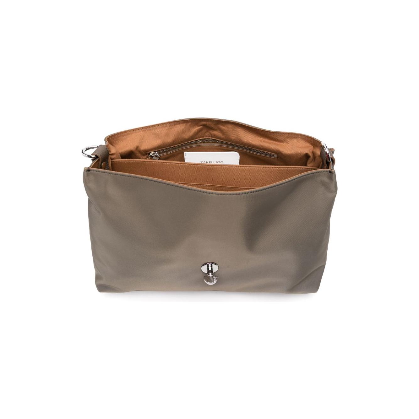 Front view with bag zipped and handles upright.