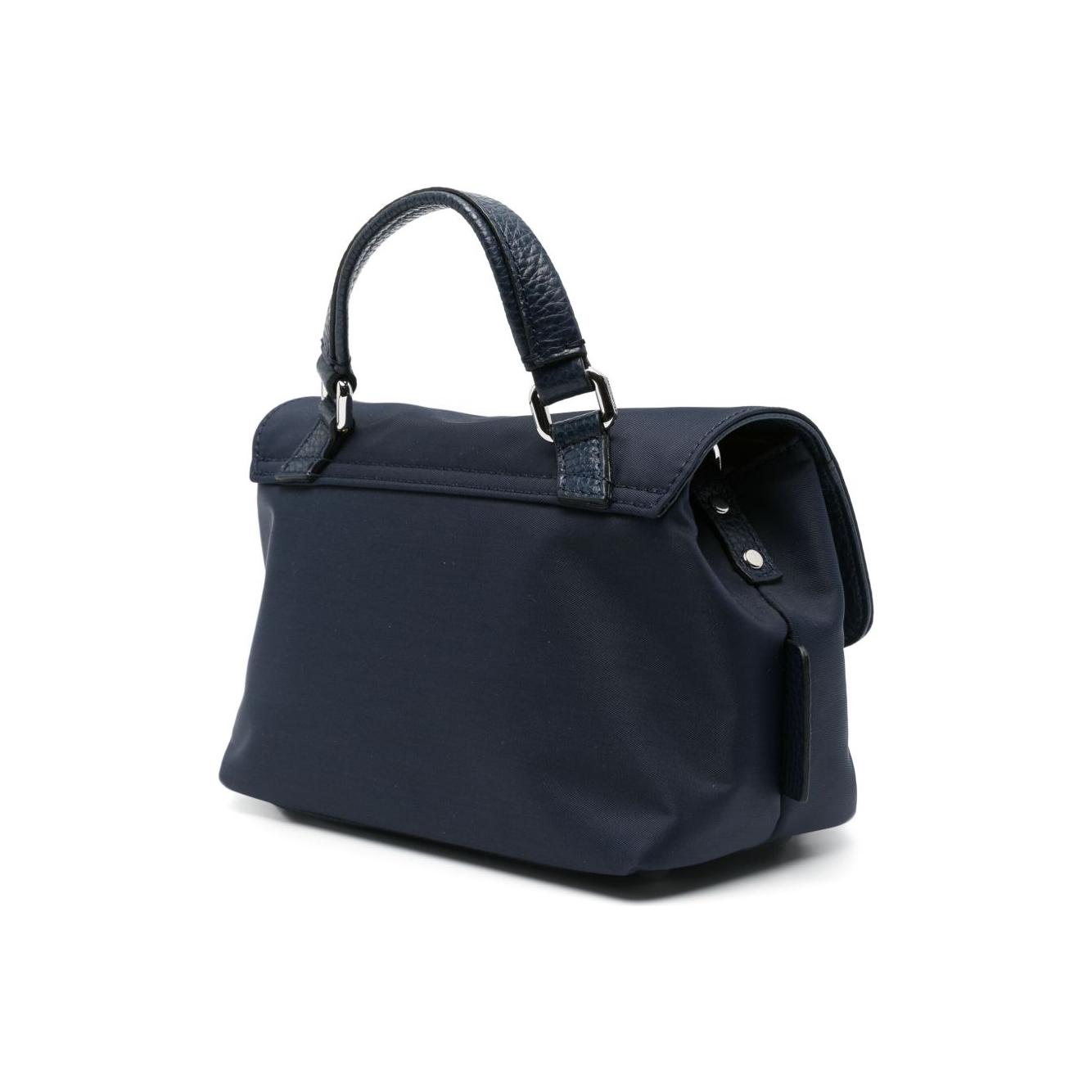 Front view with bag zipped and handles upright.