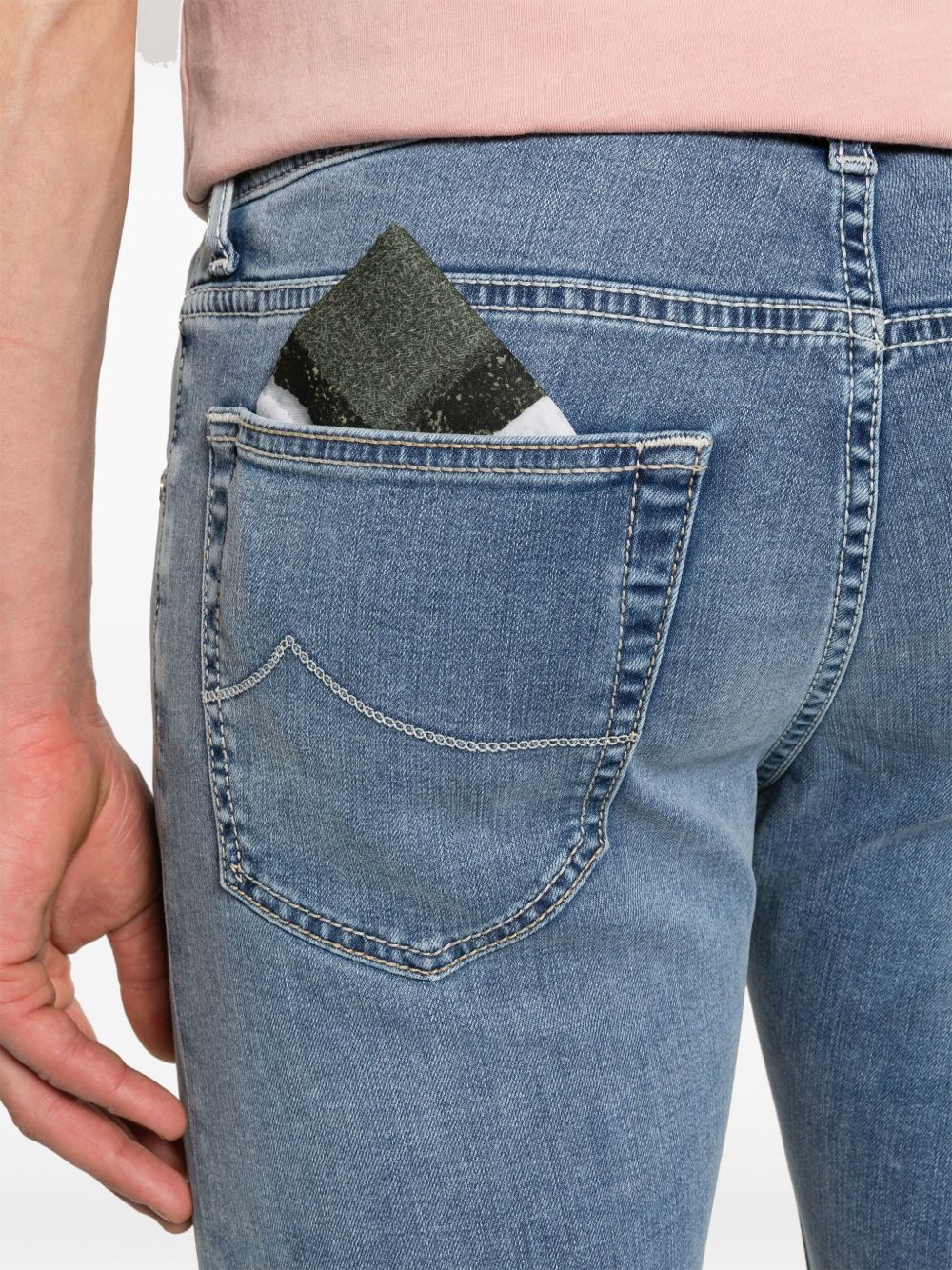 Front view with bag zipped and handles upright.