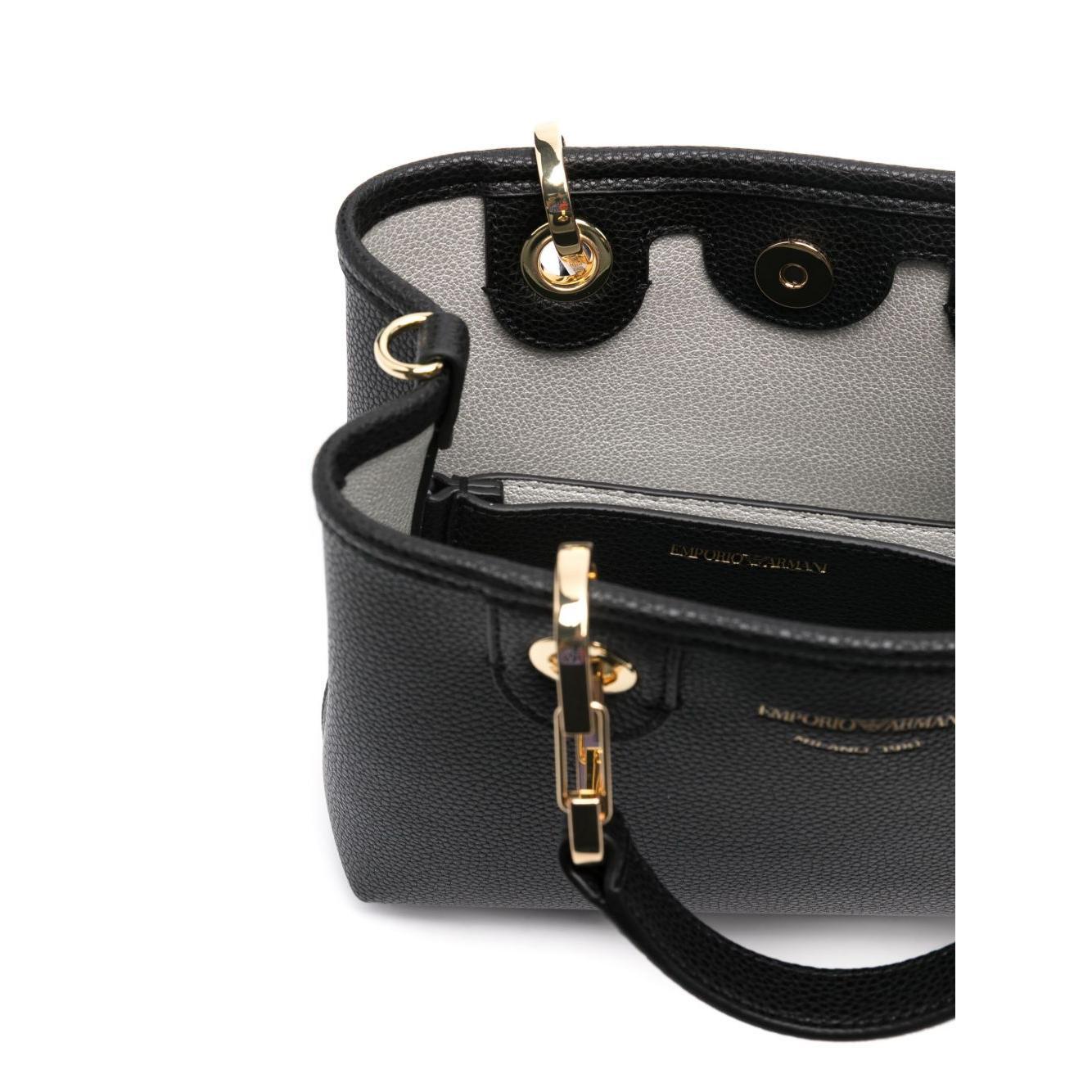 Front view with bag zipped and handles upright.