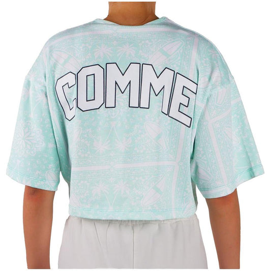 Back view of green Comme Des Fuckdown t-shirt with abstract print and bold logo.