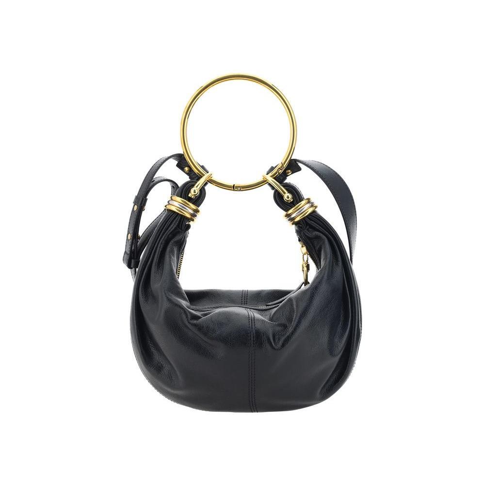 Front view with bag zipped and handles upright.