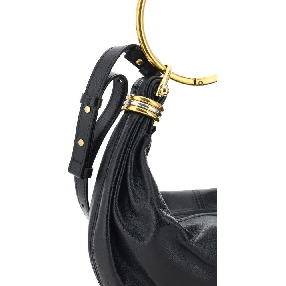 Front view with bag zipped and handles upright.