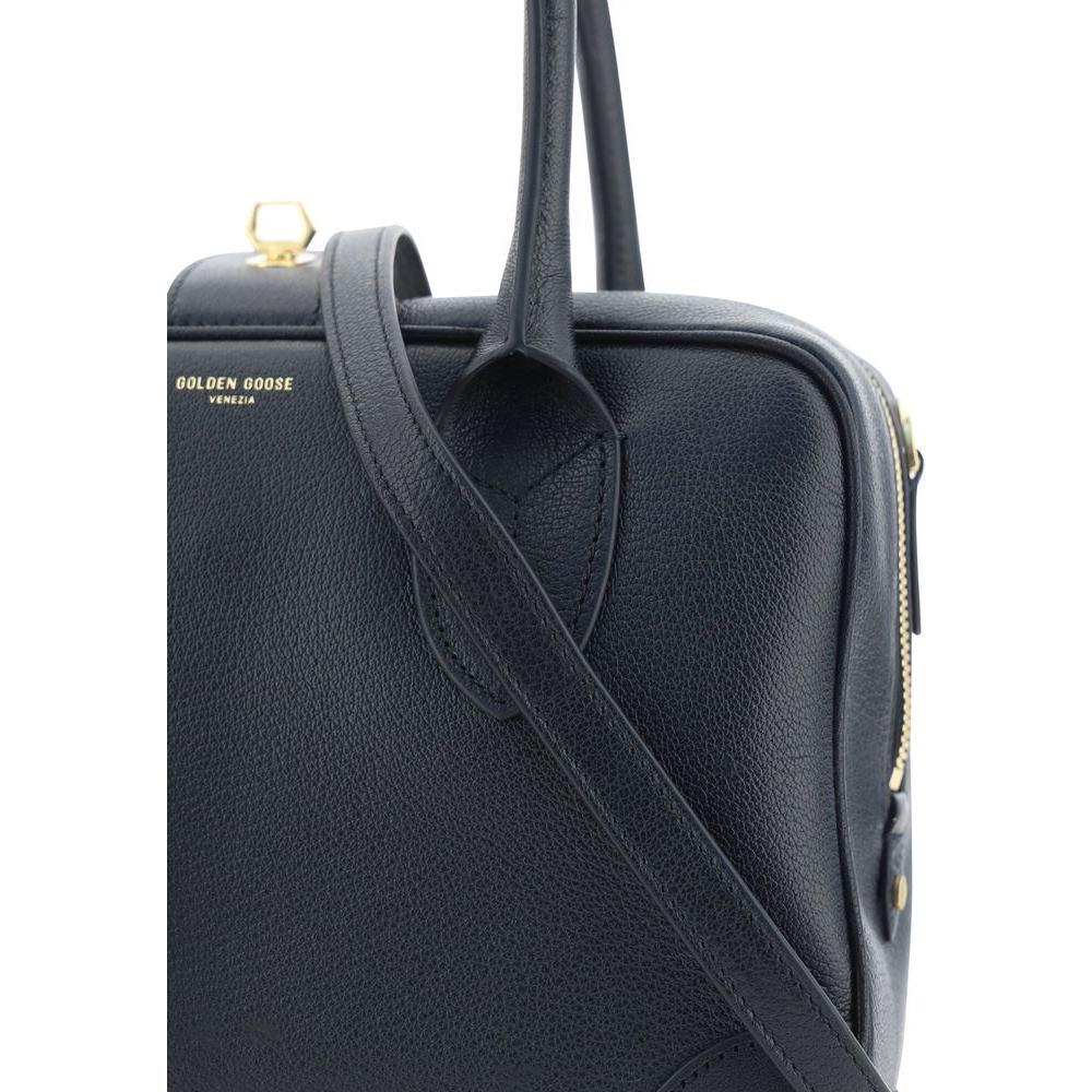 Front view with bag zipped and handles upright.