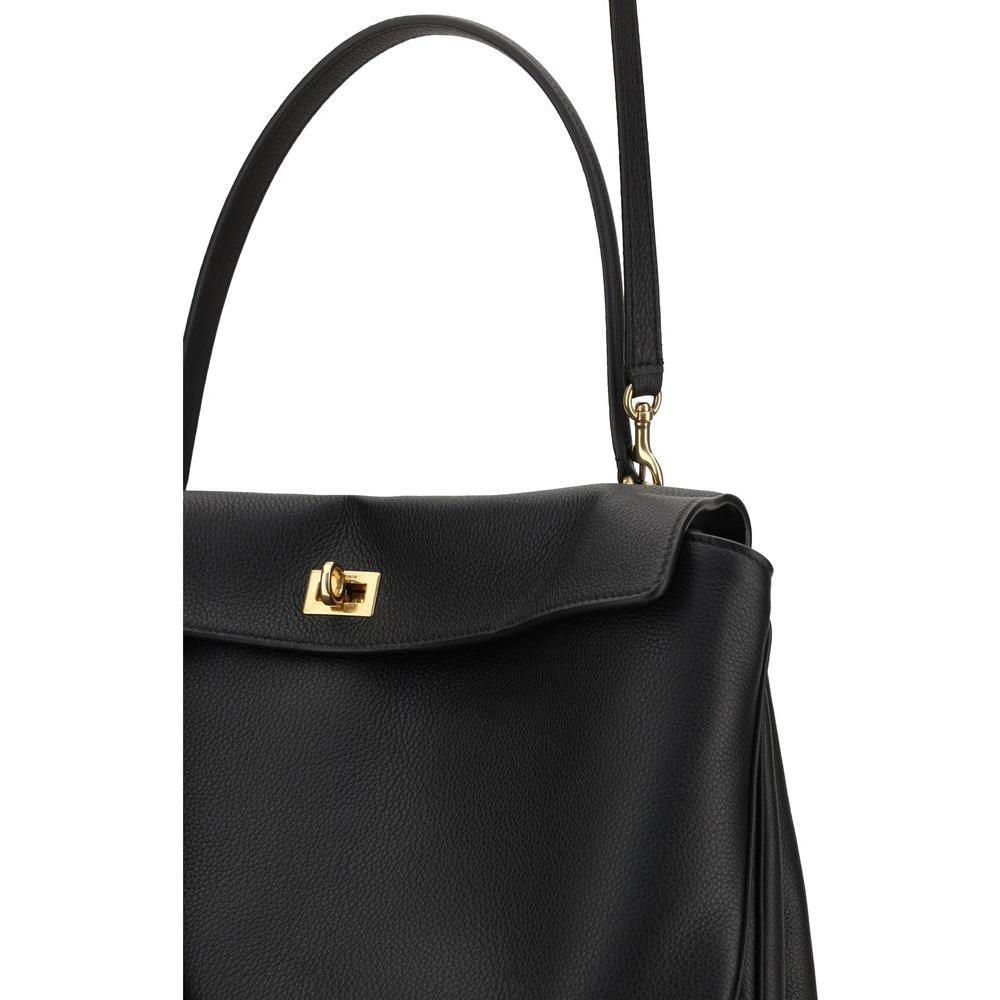 Front view with bag zipped and handles upright.