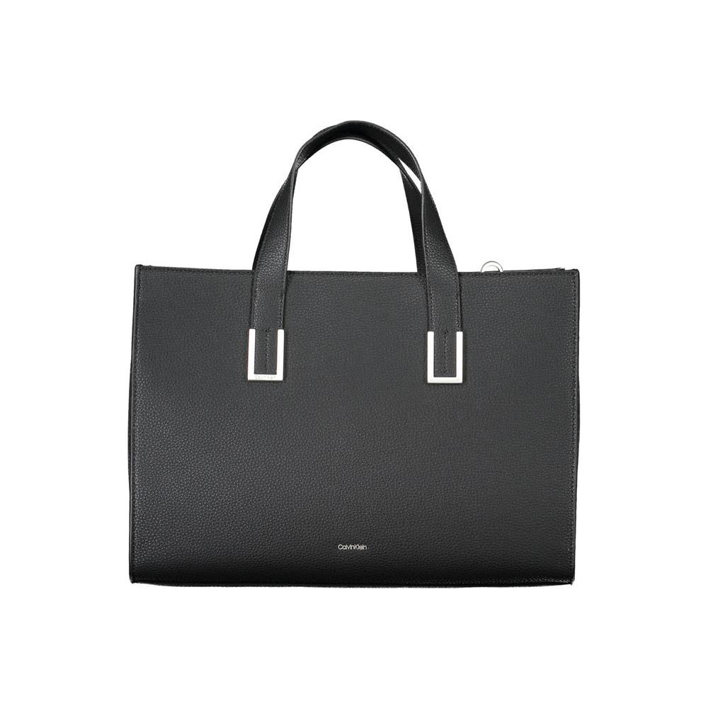 Front view with bag zipped and handles upright.