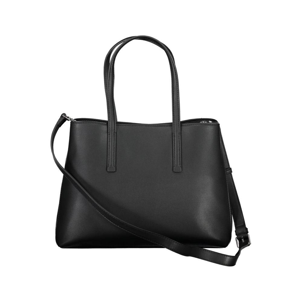 Front view with bag zipped and handles upright.