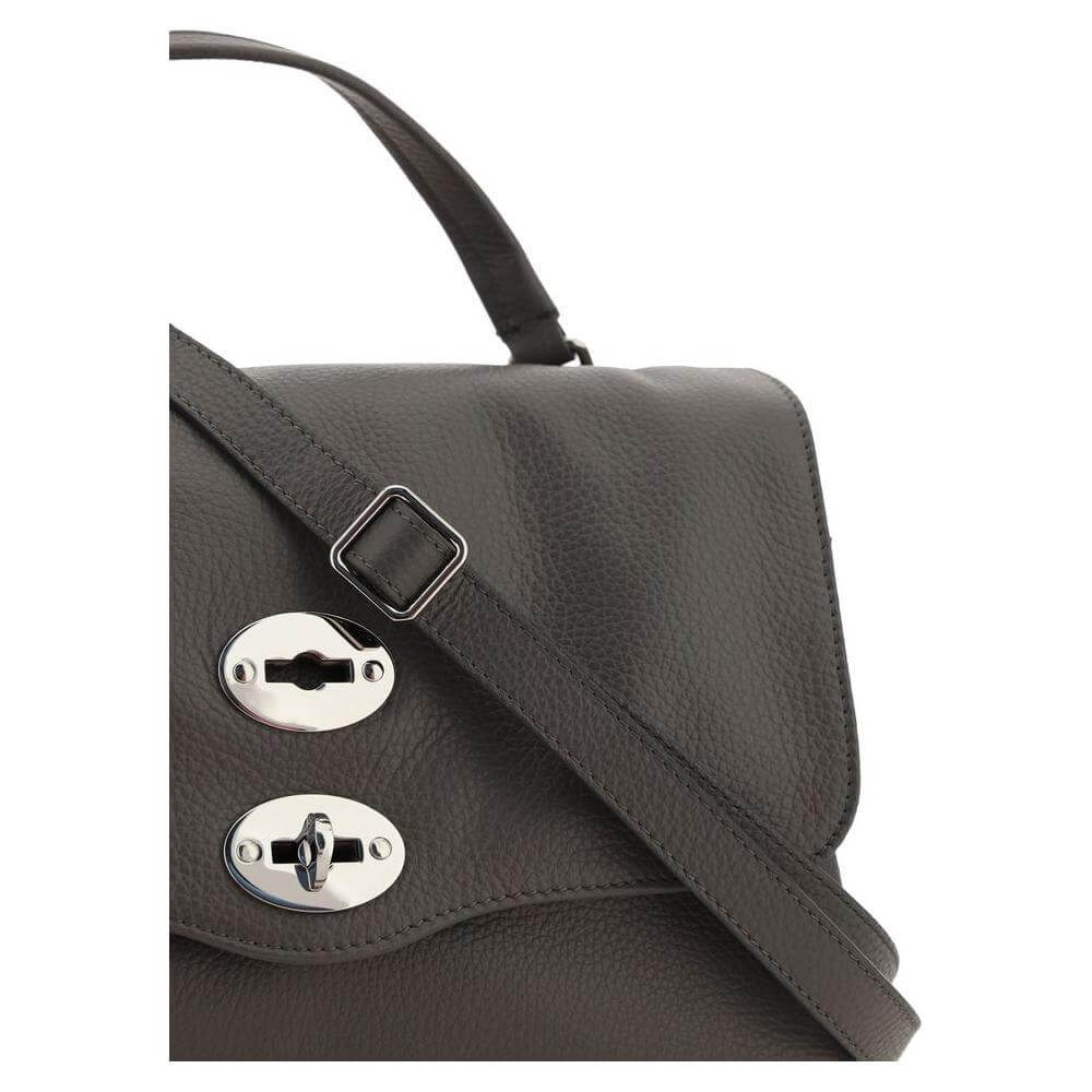 Front view with bag zipped and handles upright.