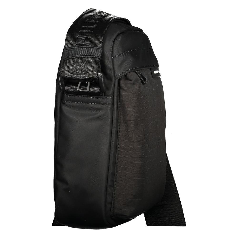 Front view with bag zipped and handles upright.