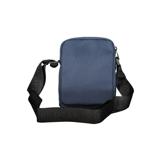 Tommy Hilfiger blue shoulder bag with adjustable strap, zip closure, and pockets, made of recycled polyester.