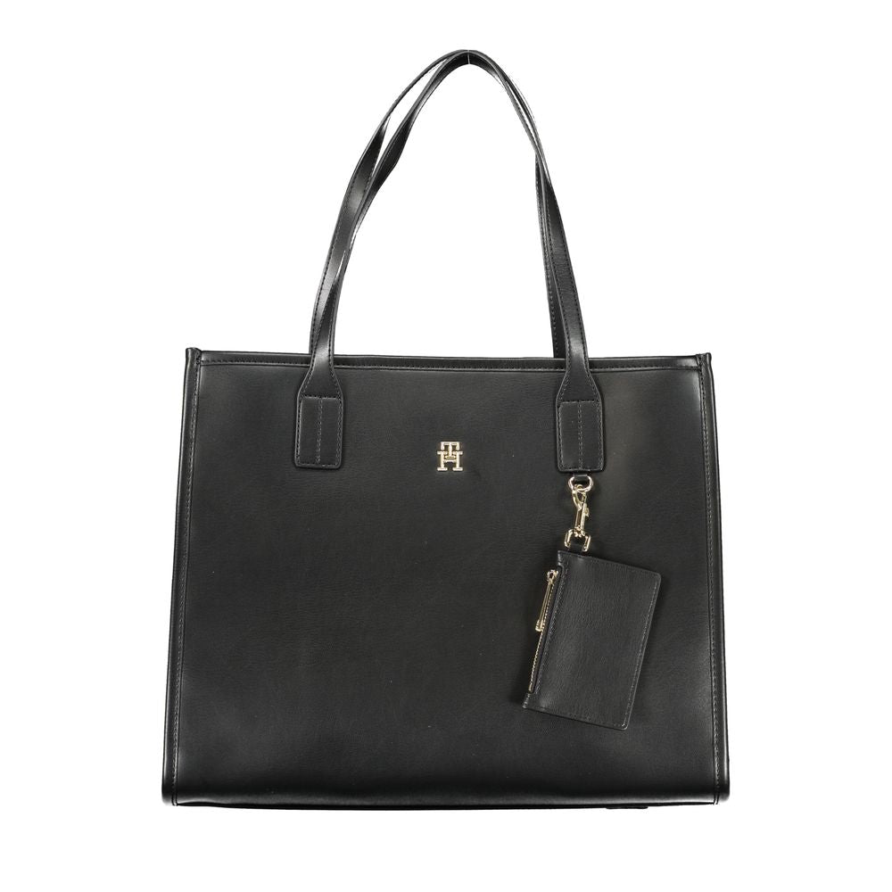 Front view with bag zipped and handles upright.
