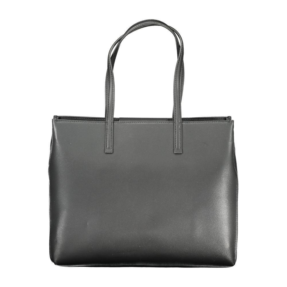 Front view with bag zipped and handles upright.