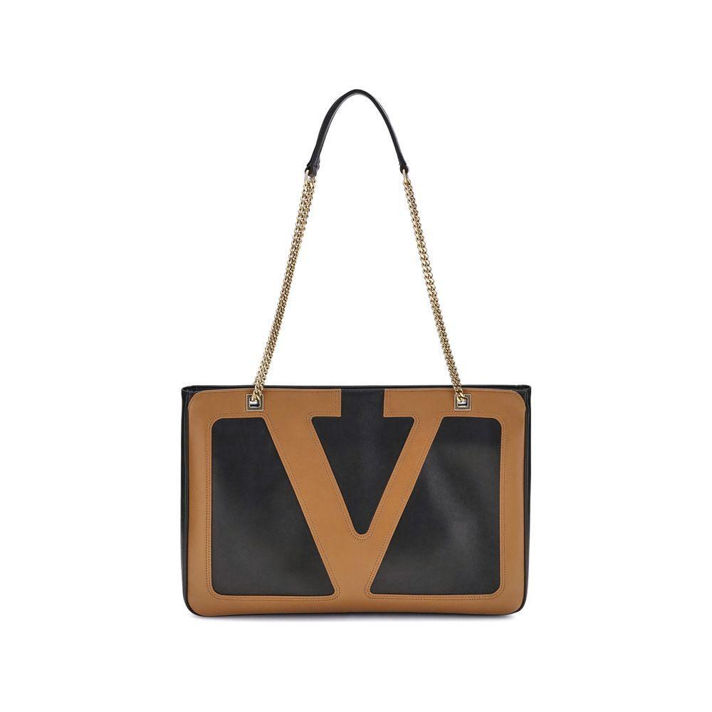 Front view with bag zipped and handles upright.