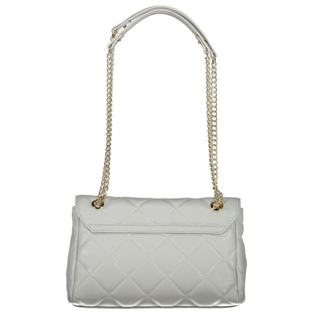 Front view with bag zipped and handles upright.