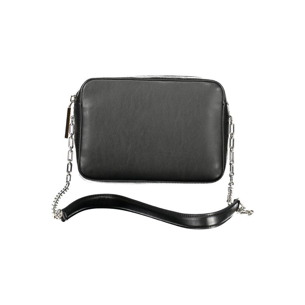 Front view with bag zipped and handles upright.