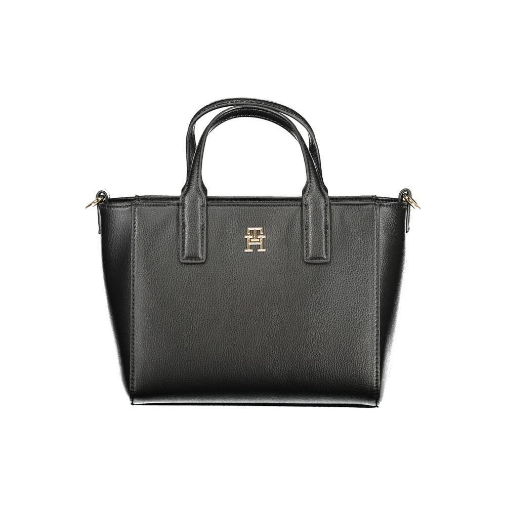 Front view with bag zipped and handles upright.