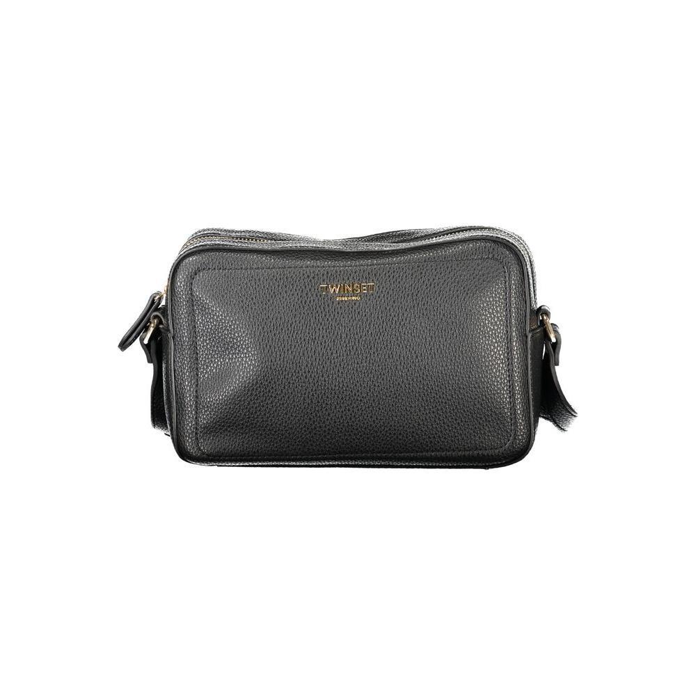 Front view with bag zipped and handles upright.