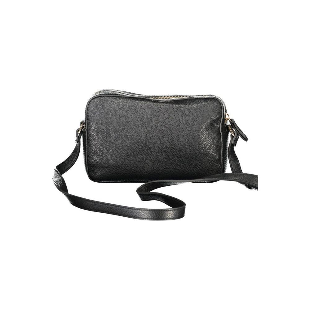 Front view with bag zipped and handles upright.