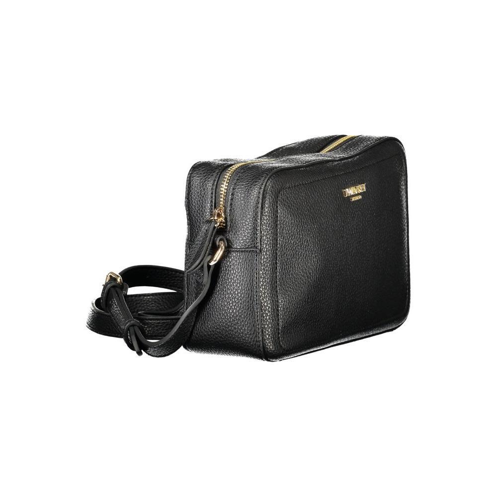 Front view with bag zipped and handles upright.