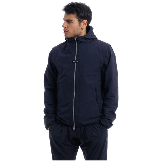 Herno blue nylon jacket with hood, mesh lining, and removable sleeves displayed on a mannequin, two side pockets visible.