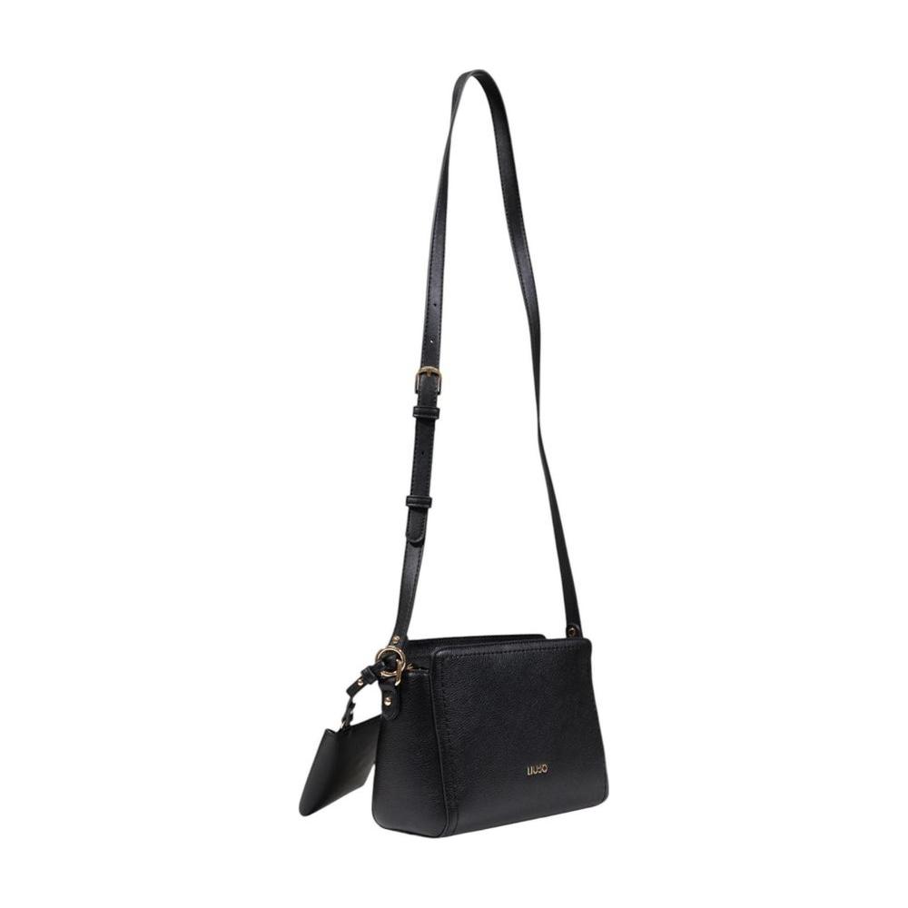 Front view with bag zipped and handles upright.