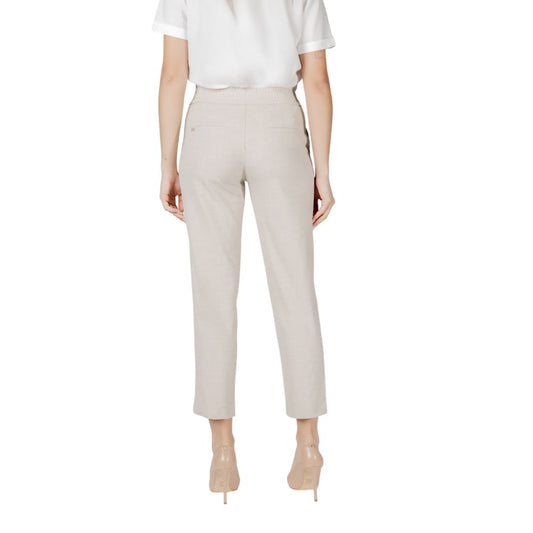 Back view of a model wearing Street One Beige Viscose Jeans & Pant, featuring a regular fit with a stylish buckle belt.